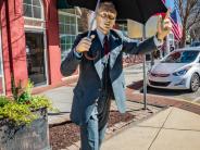 man holding umbrella 